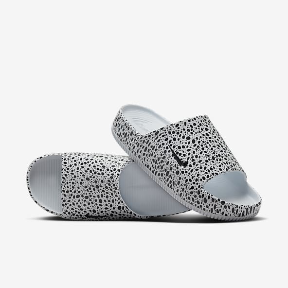 Gray nike flip flops clearance